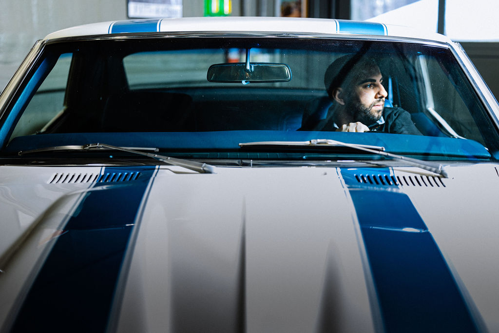 Russ sitting in the drivers seat of the 1969 Trans Am